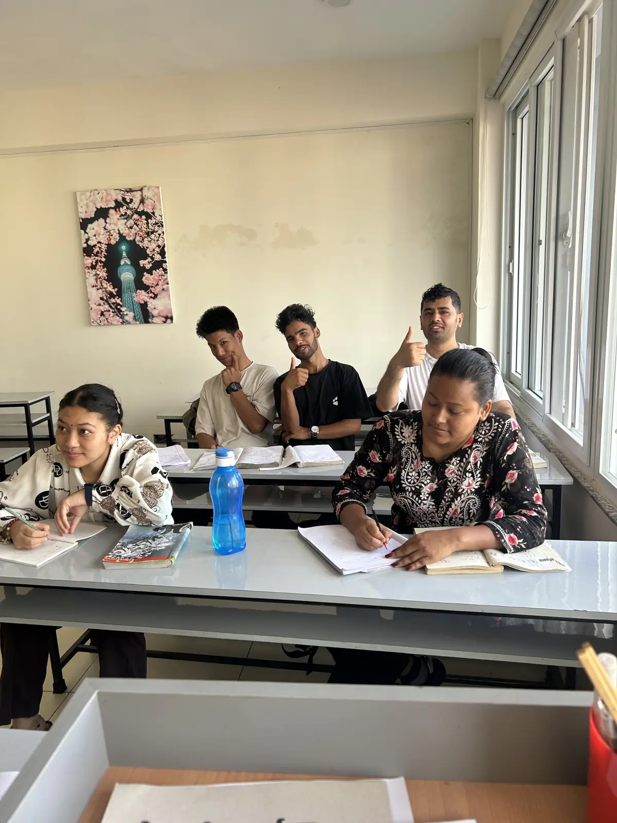 Students studying Japanese together in a small group